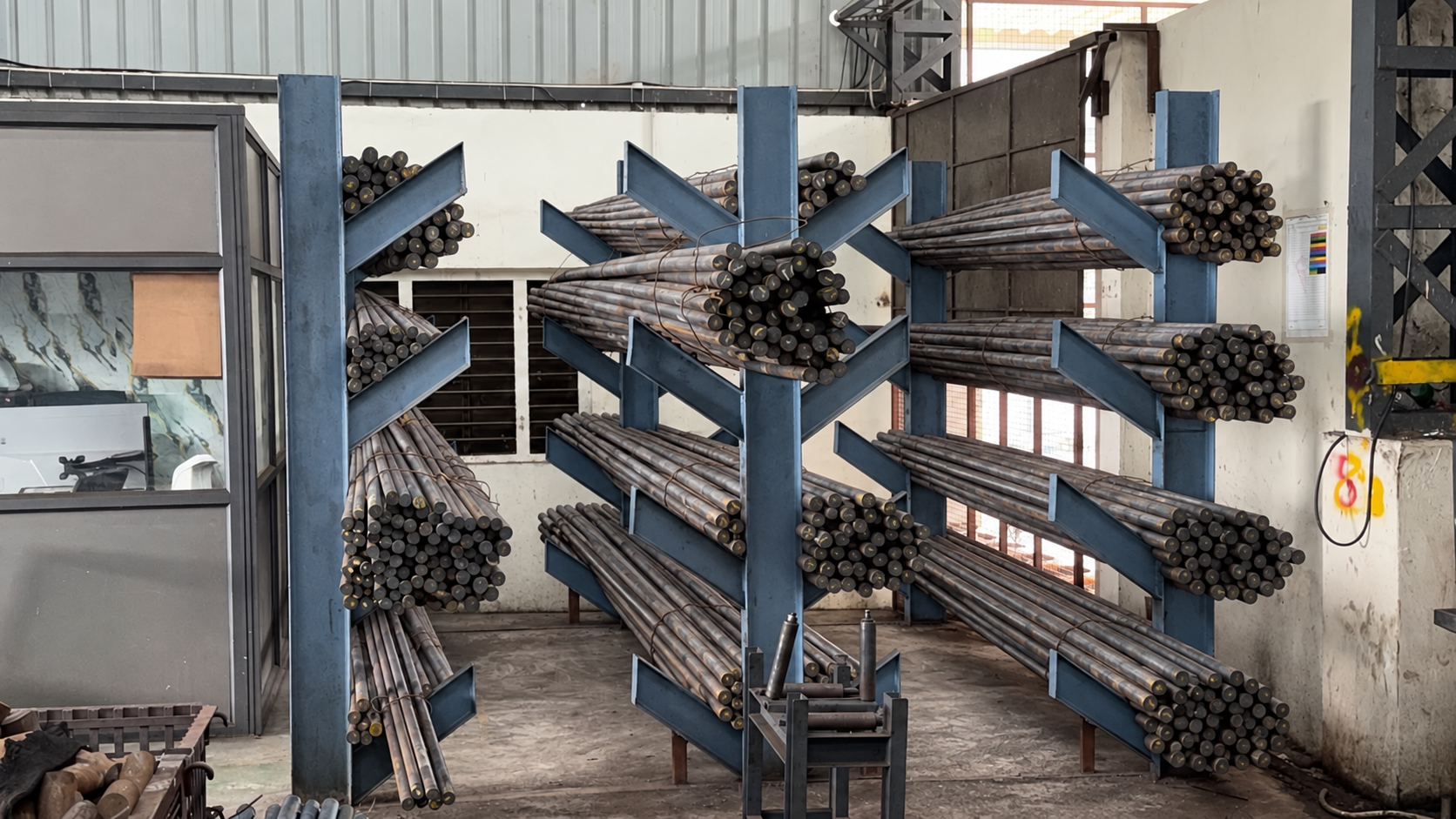 Raw Material Yard &mdash; Certified Steel Round Bars on Cantilever Racks
